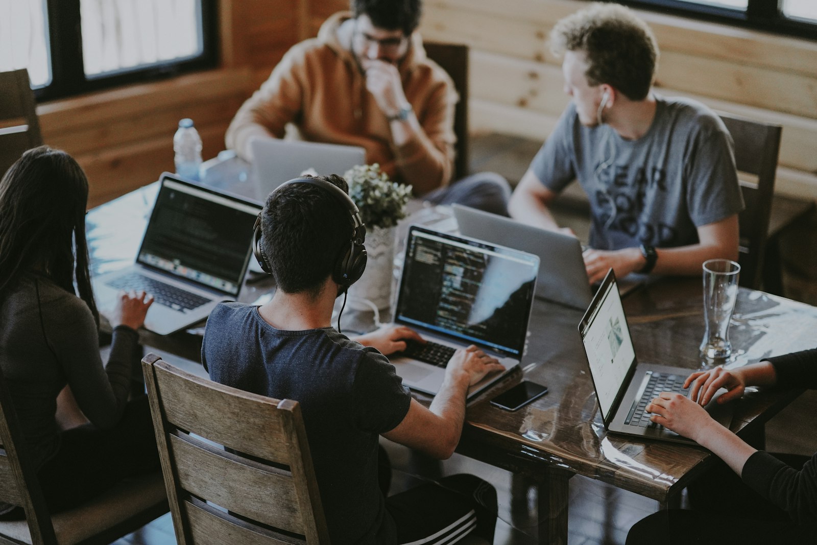 Technology professionals working together in a modern workspace